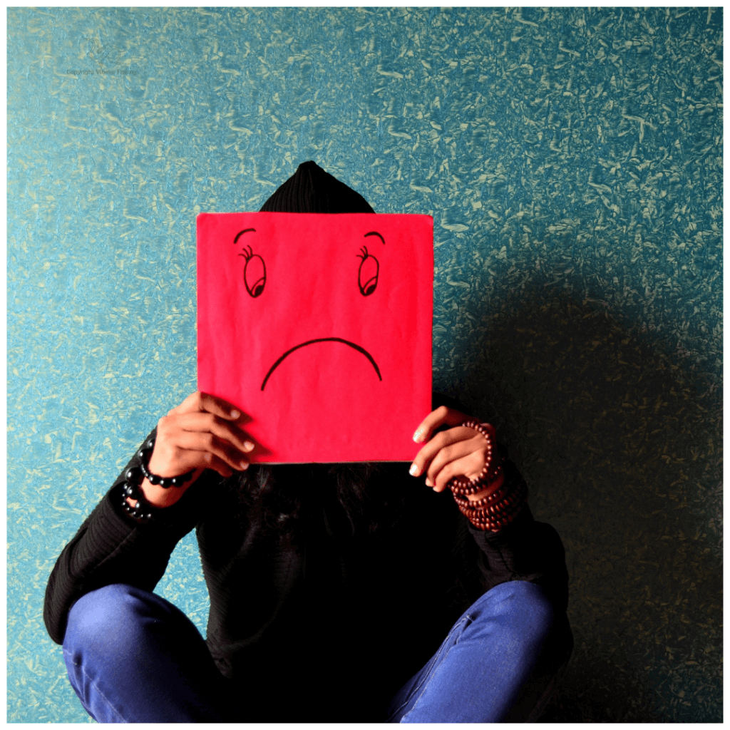 Sur smiley rød